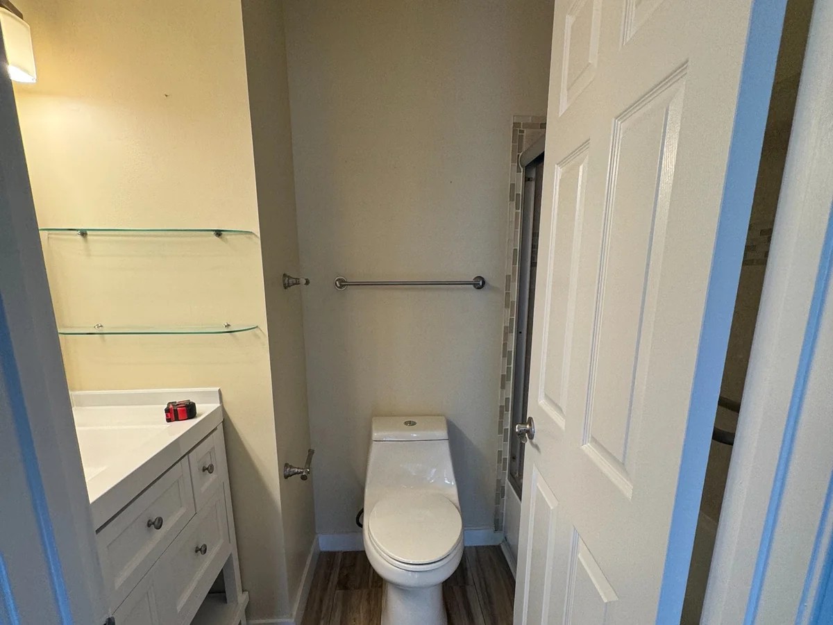 Original bathroom in Springfield, VA before full gut renovation and bathtub-to-shower conversion.
